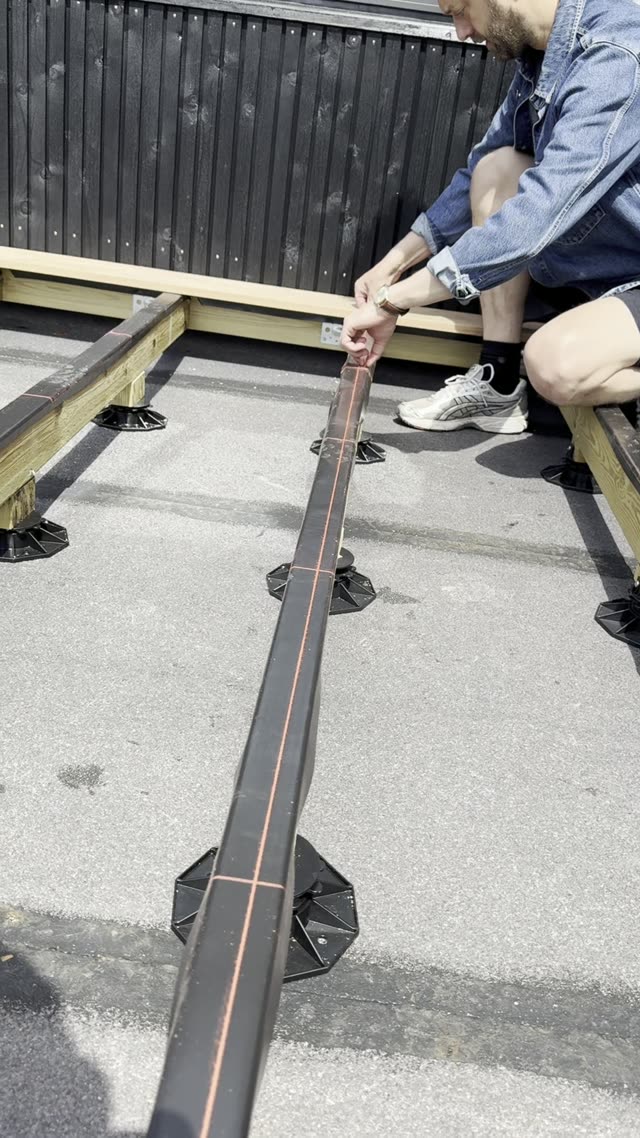 Terrassekonstruktion ovenpå paptag